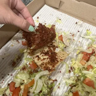 "Bacon" lifts right off of pizza crust making it impossible to eat (and chew)