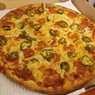 a pepperoni and jalapeno pizza