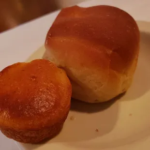 two rolls of bread on a plate