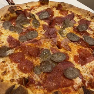 a pepperoni and sausage pizza