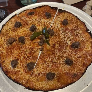 Pizza with hot oil and (sadly very few) meatballs.