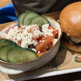 Lamb and mint burger with a side salad.