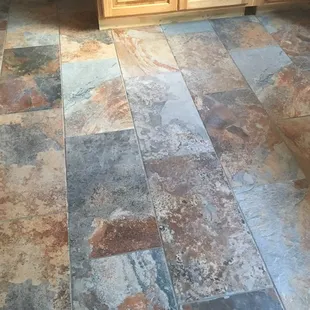 a tile floor in a kitchen