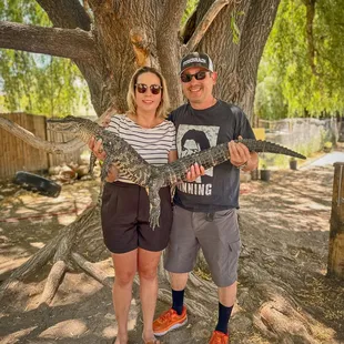 Colorado Gators Reptile Park.  Us posing with an alligator named Morticia.