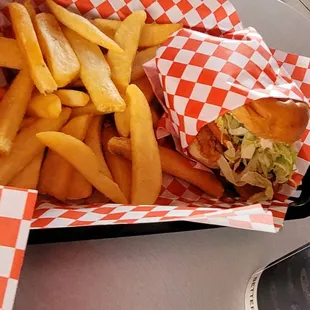  a basket of fries and a sandwich