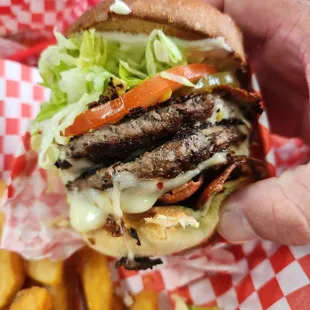 Double bacon burger with a fried egg