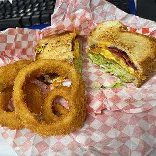 Bacon and egg sandwich with onion rings