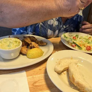 Fried shrimp and bread (yum) and salad