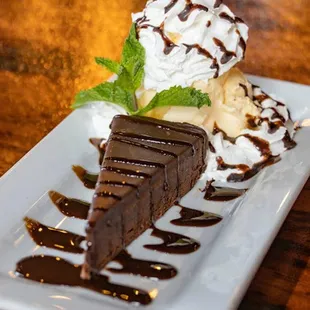 a piece of chocolate cake and ice cream