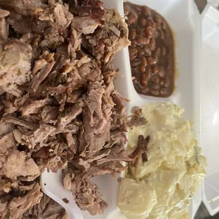 a plate of pulled pork and beans