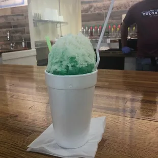 Shrek stuffed with sno cap and topped with sno cap and sour blast. YUMMMMYYYYYYY