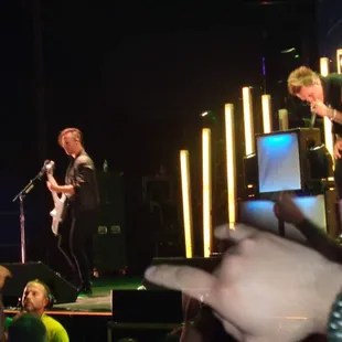  band performing on stage