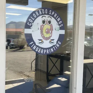 You know you're in the right place with "Printy!" the fingerprint fanatic out front.