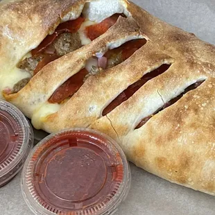 a hot dog with cheese and ketchup