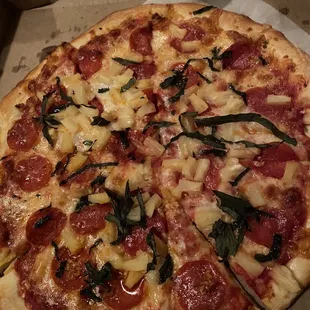 Pepperoni and extra pineapple pizza with fresh garlic
