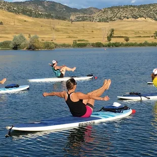 SUP Yoga.  Yes its possible and fun.