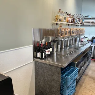 a bar with bottles of wine