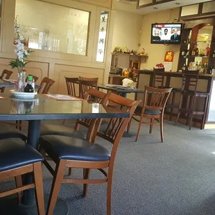 Tv by the bar area near the front door, same area you would pick up food if you ordered to go.