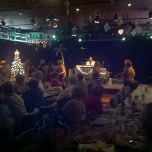 a group of people sitting around a table