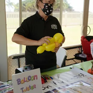 Balloon twisting.