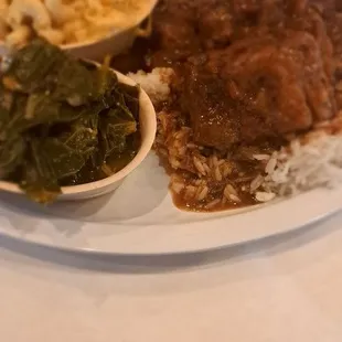 Oxtail with rice and gravy; Collard Greens and Mac n Cheese