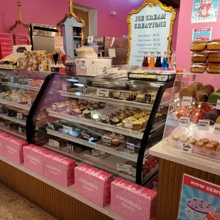 a display of a variety of cupcakes