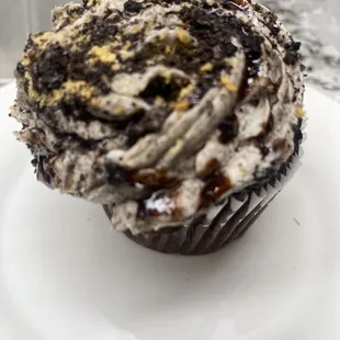 Oreo with cheesecake frosting and omg all that drizzle.  1 Colossal Cupcake