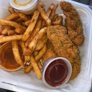 Chicken tenders tossed in lemon pepper . Side of buffalo sauce .