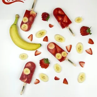 a banana, strawberries, and strawberries