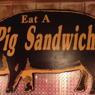 a pig sandwich sign