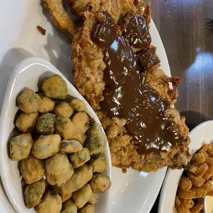 Chicken fried steak with mushroom gravy and okra.