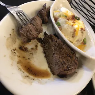 Bacon wrapped filet. Supposed to be medium... definitely well done.