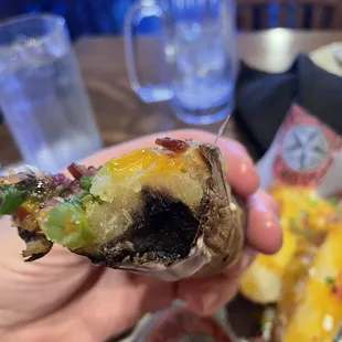 Potato skin- with black rotten sections and all. Disgusting