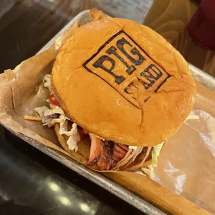 a pork sandwich on a bun