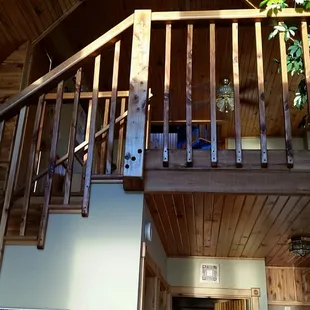 View from living room/dining room to loft bedroom