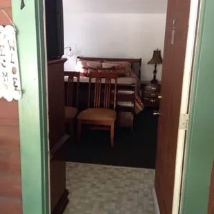 The front room with a queen sized bed