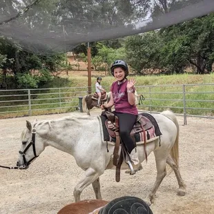 Grand daughter enjoying her ride on Sage