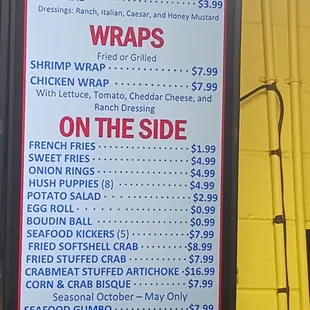 a menu on the side of a building