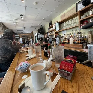 a cup of coffee on a table