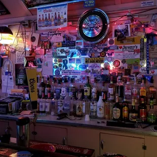 a bar with a clock on the wall