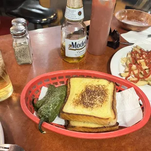 Texas toast with jalapeño and of course a Modelo in the background