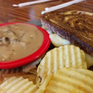 Burgo Master: grilled tenderloin grilled onions, mushrooms, &amp; swiss on rye with a garlic mushroom gravy for dipping. OMG