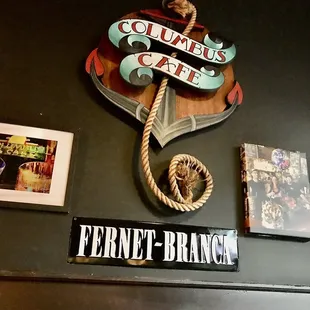 a sign on the wall of a restaurant