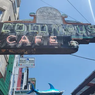 a sign for columbus cafe