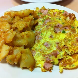 an omelet with potatoes and ham