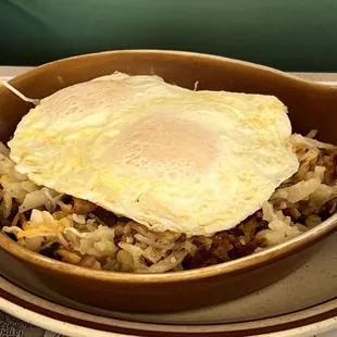 Meat skillet with eggs o er easy