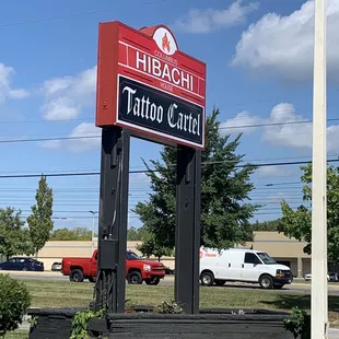 a sign for a tattoo parlor
