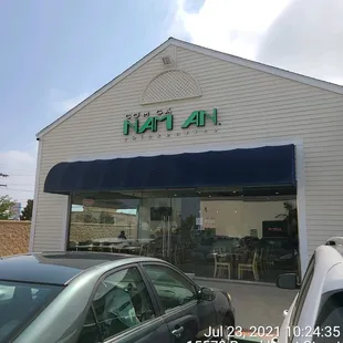 a car parked in front of a store