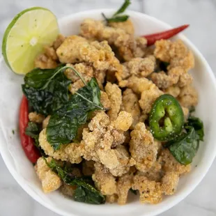 A8 - Deep-fried bite-size crispy chicken season with salt and pepper and optional Jalapeno peppers