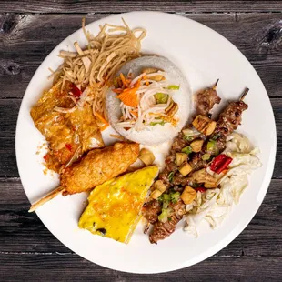 a plate of food on a wooden table